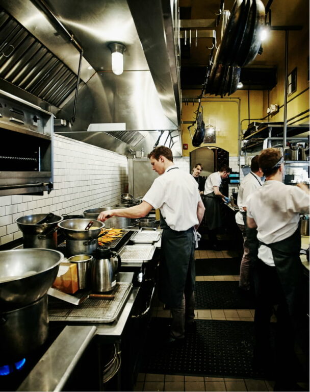 commercial kitchen with workers